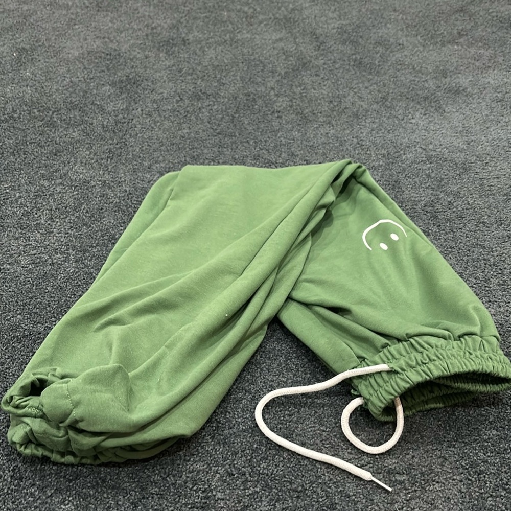 Green sweatpants